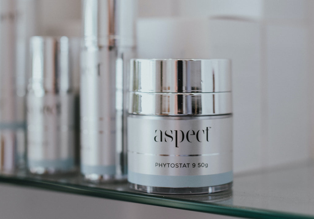 Photo of Aspect Skincare products lined up on a shelf
