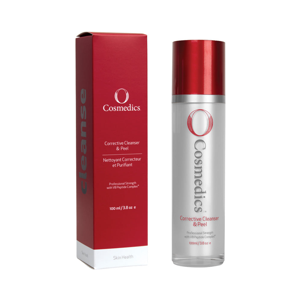 O Cosmedics corrective cleanser and peel in silver container with red lid next to red packaging in front of white background