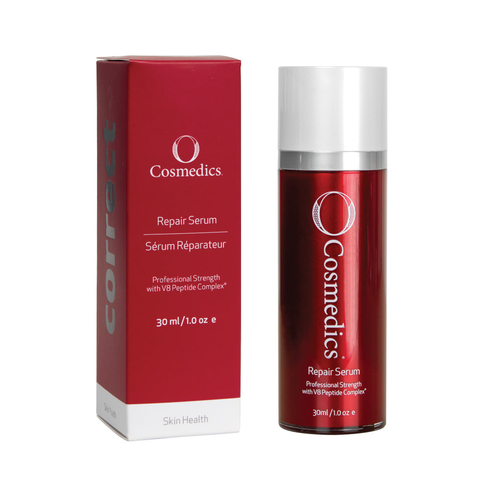 O cosmedics repair serum in red container with white lid next to red packaging box in front of white background