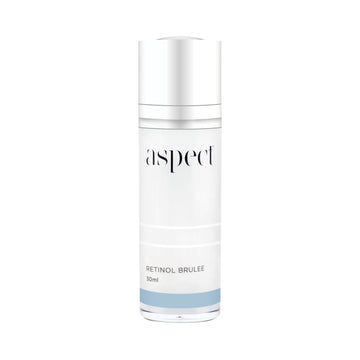 Aspect Skincare retinol brulee in light grey container and silver lid in front of white background