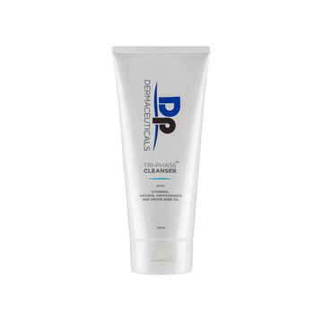DP Dermaceuticals tri phase cleanser in white container in front of white background