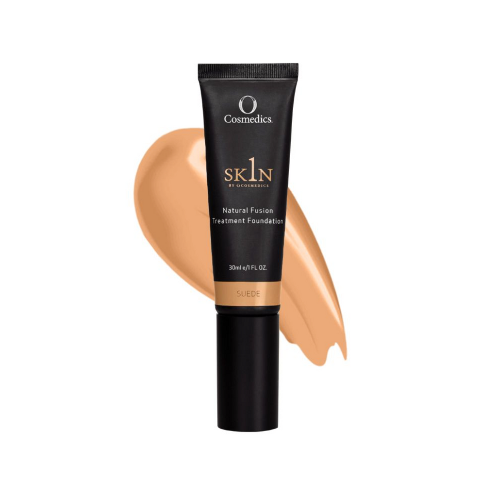 1skin suede natural fusion treatment foundation in front of an orange smear and a white background