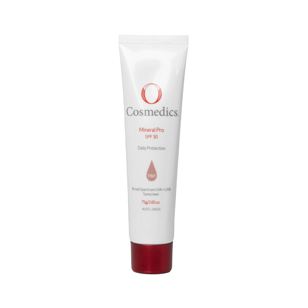 O Cosmedics mineral pro spf 30+ tinted in white container with red lid in front of white background