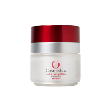 O cosmedics youth activating oil balm in white container with red lid in front of a white background