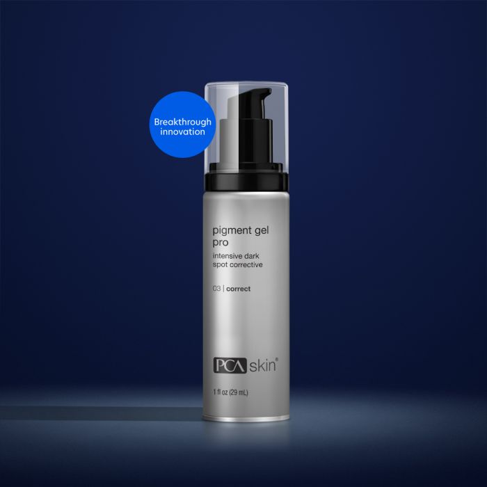 PCA Skin pigment gel pro in silver container with black lid in front of a dark blue background
